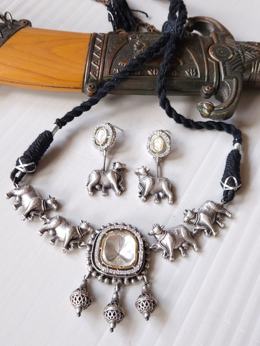 Buy Nandi Style Polki Kundan German Silver Necklace Set - TheJewelbox