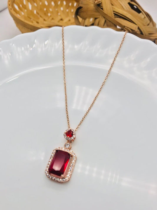 Buy Ruby Red Rectangular Pendant Rose Gold Chain Necklace - TheJewelboxBuy Ruby Red Rectangular Pendant Rose Gold Chain Necklace - TheJewelbox