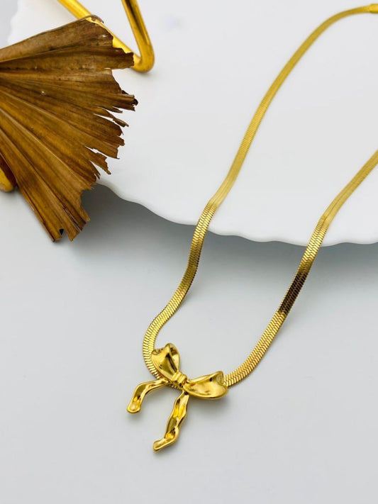 Buy Stylish Bow Pendant Golden Plated Snake Chain Necklace Online - TheJewelbox