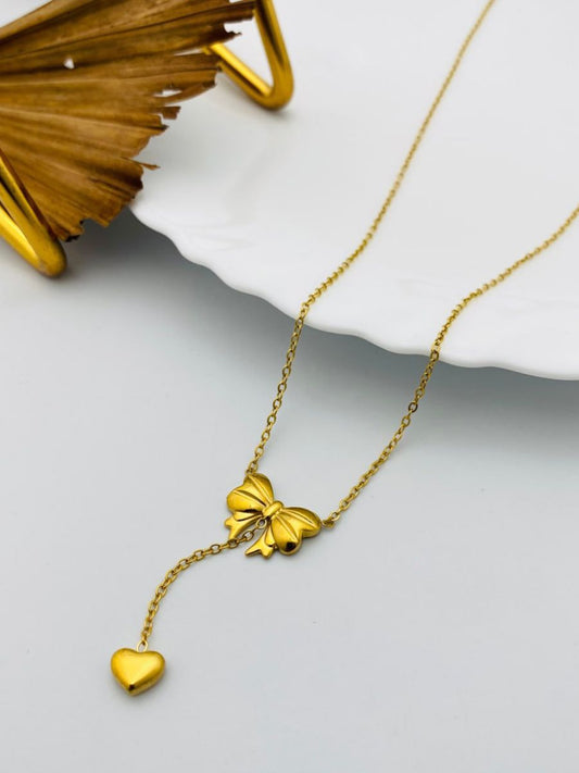 Buy  Stylish Hanging Bow Charm Golden Chain Necklace Online - TheJewelbox